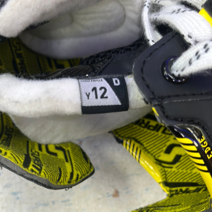 Used Bauer Supreme M4 Size 12 Youth Skates