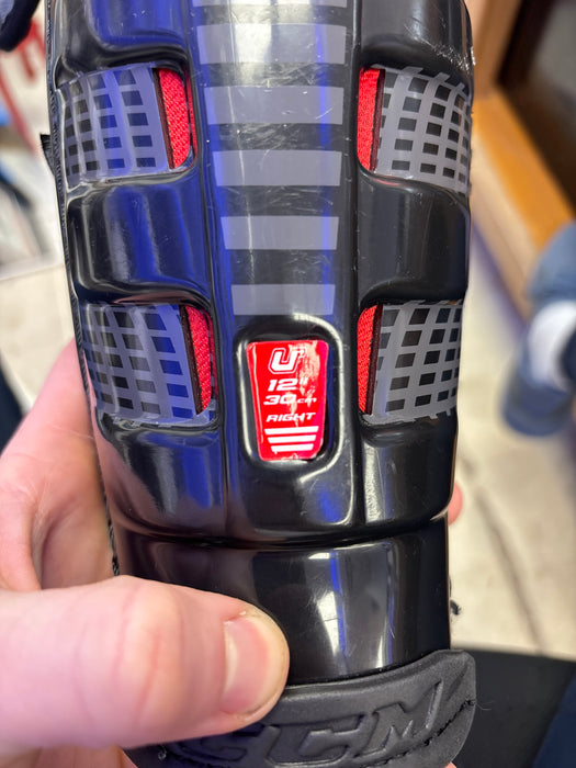 Used CCM U+ 12” Junior Shin Guards